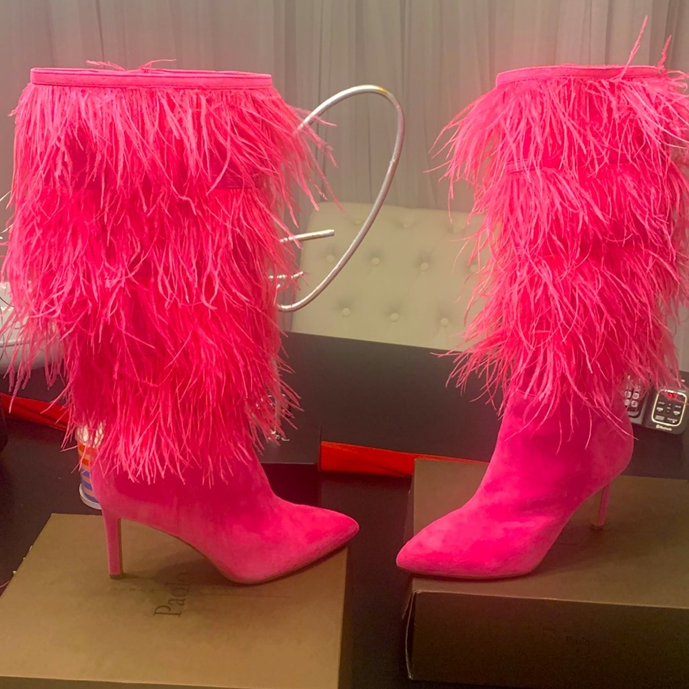 Stepping into style with these pink suede boots, never worn